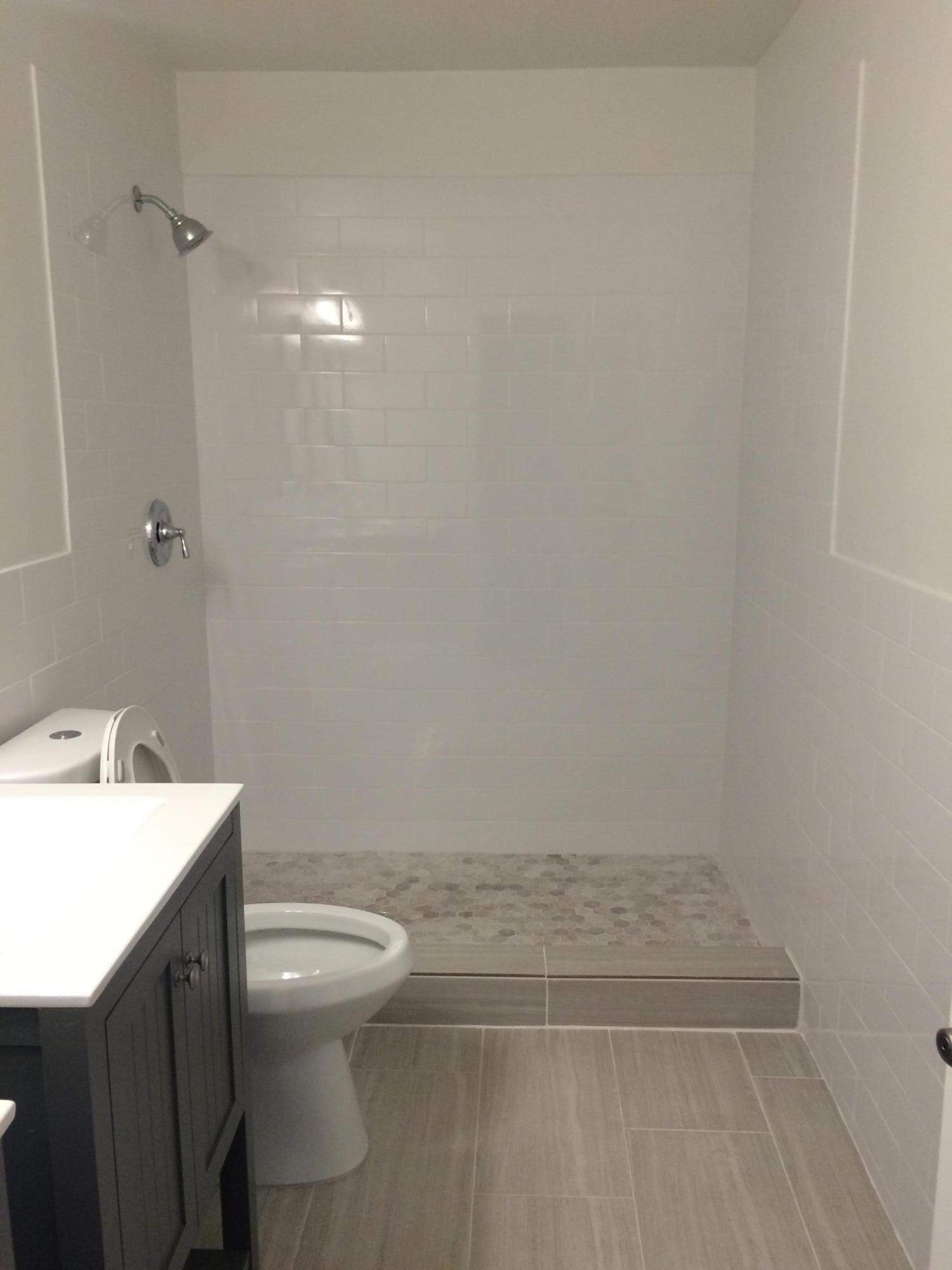21580 Magdalena Terrace Boca Raton, FL 33433 - Photo 30 of 32 a bathroom with a sink a toilet and shower