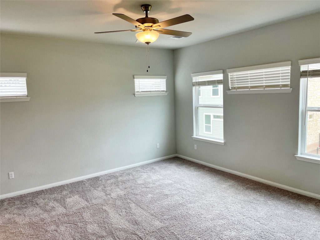 143 Delaware Lane Kyle, TX 78640 - Photo 13 of 30 a view of an empty room with a window