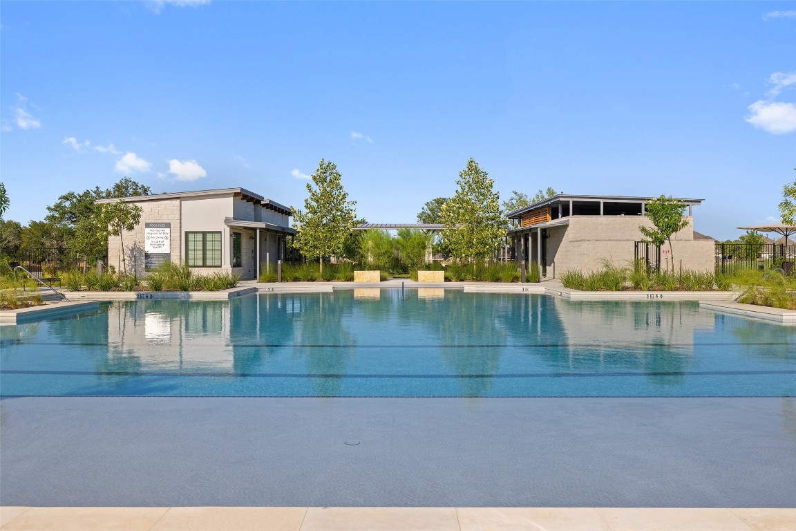 143 Delaware Lane Kyle, TX 78640 - Photo 28 of 30 a view of swimming pool with outdoor seating