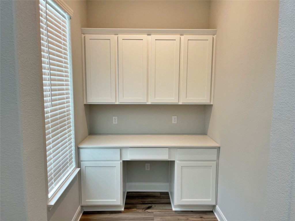 143 Delaware Lane Kyle, TX 78640 - Photo 3 of 30 a bathroom with a sink and a mirror