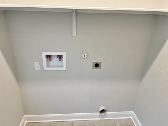 a view of a air conditioner and window in a room