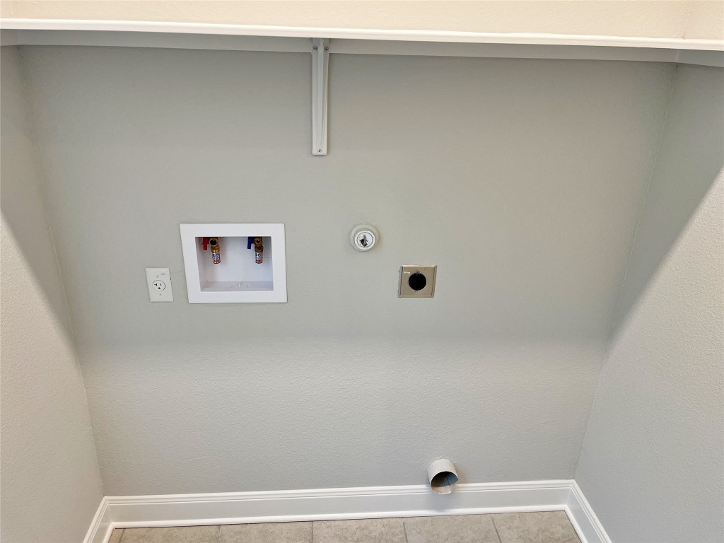 143 Delaware Lane Kyle, TX 78640 - Photo 9 of 30 a view of a air conditioner and window in a room