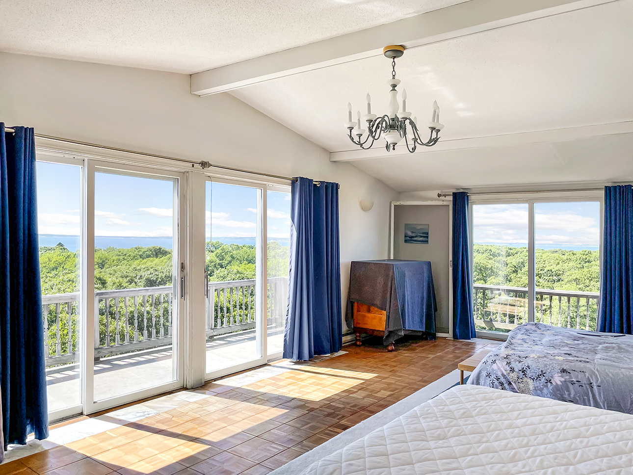 70 Capawock Road West Tisbury, MA 02568 - Photo 14 of 23 a bedroom with a large bed and a window