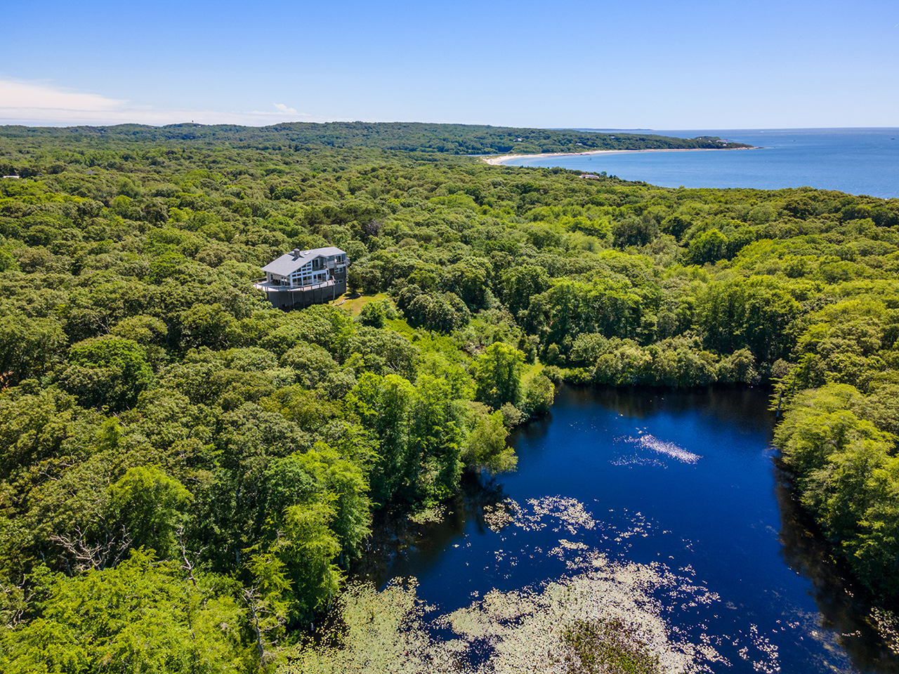 70 Capawock Road West Tisbury, MA 02568 - Photo 4 of 23 a view of a city with ocean view