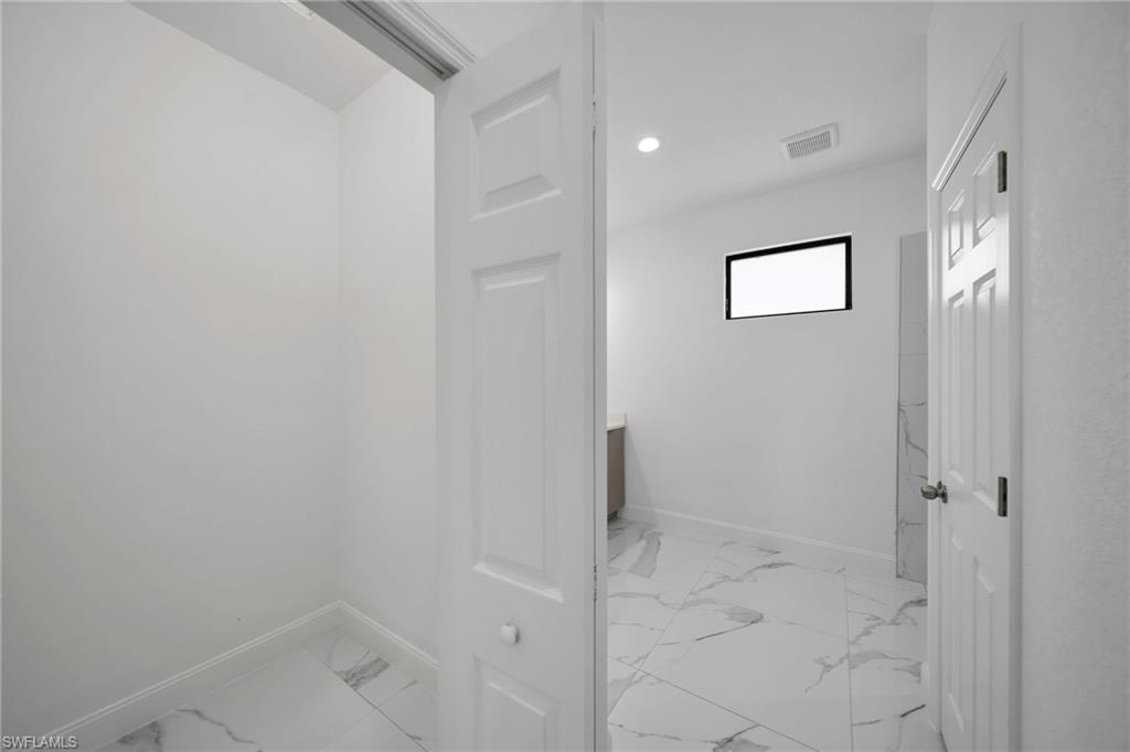 3804 40th Street Southwest Lehigh Acres, FL 33976 - Photo 14 of 24 a view of an empty room