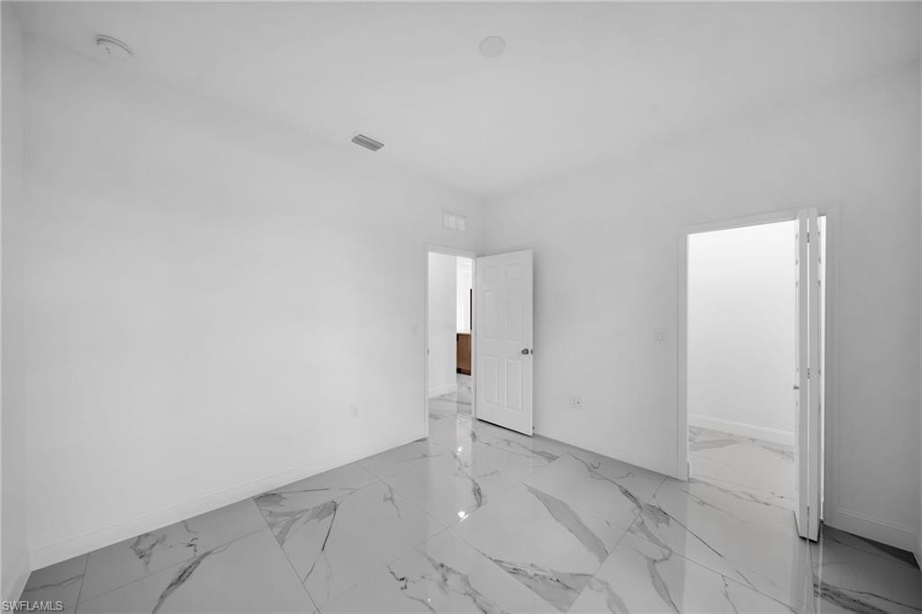 3804 40th Street Southwest Lehigh Acres, FL 33976 - Photo 22 of 24 a view of an empty room