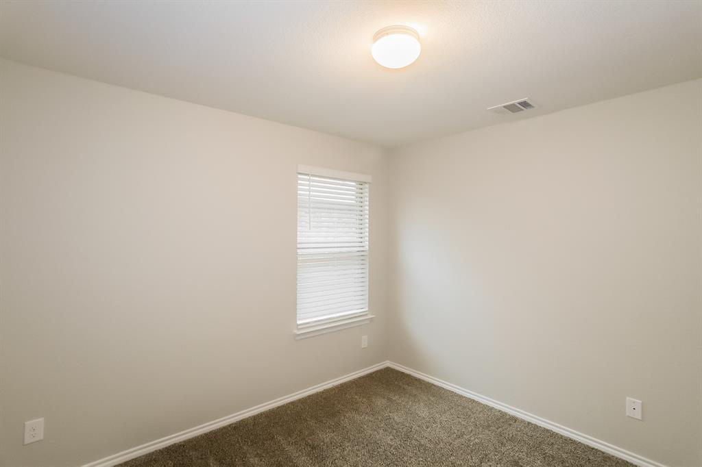 3113 Parsons Street Fate, TX 75189 - Photo 11 of 15 an empty room with a window