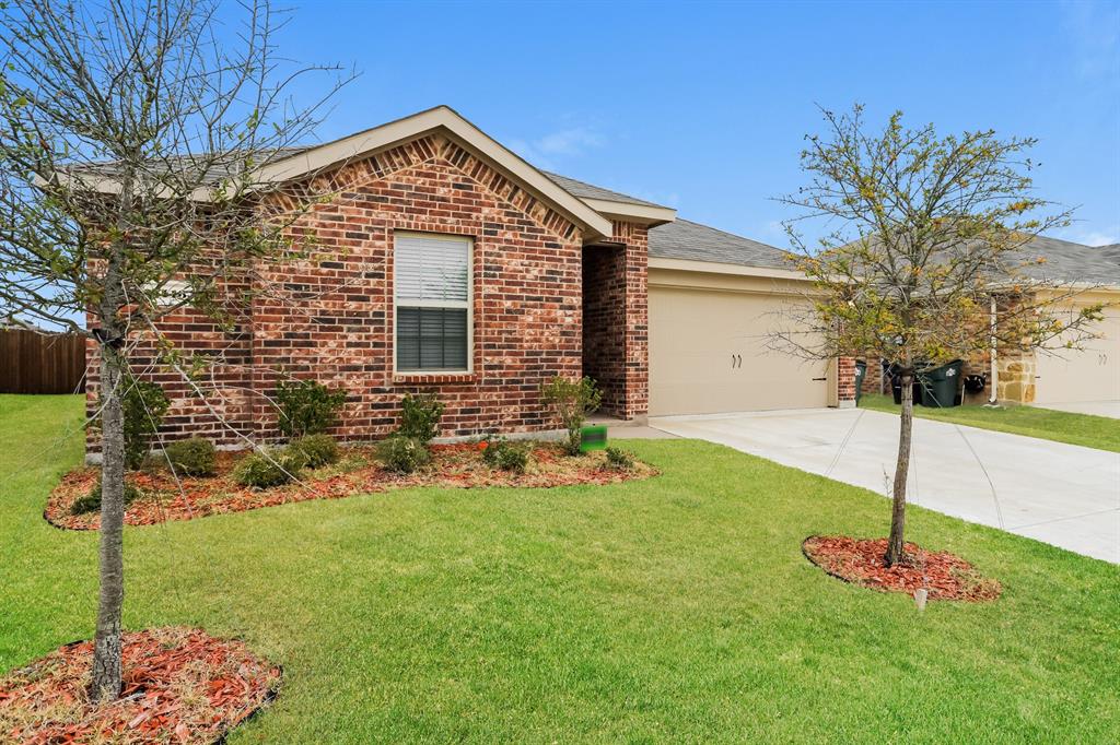 3113 Parsons Street Fate, TX 75189 - Photo 2 of 15 a front view of a house with a yard