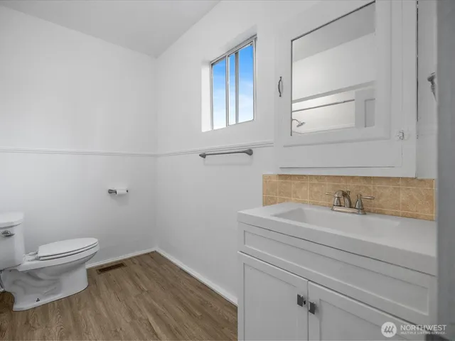 a bathroom with a sink and a toilet