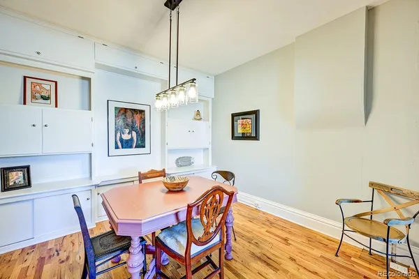 a kitchen with stainless steel appliances a refrigerator sink and cabinets