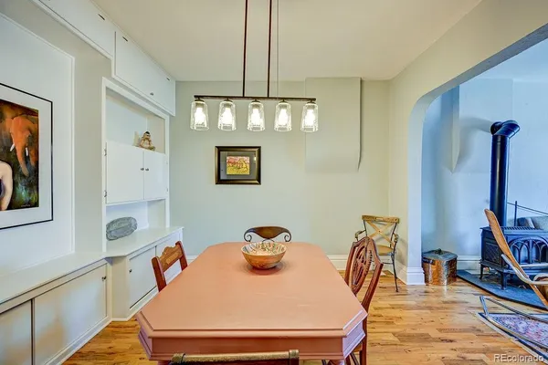 a bedroom with a bed and a rug