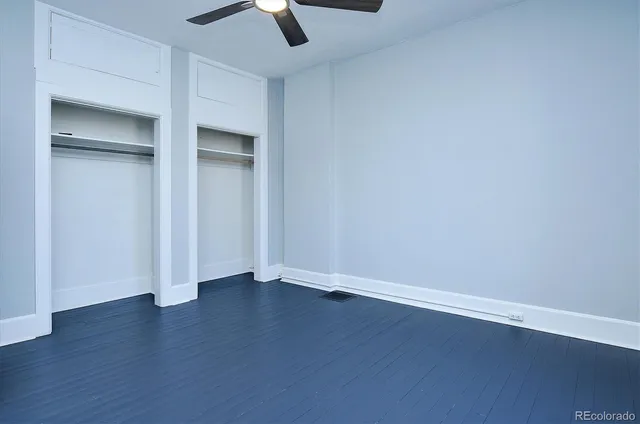 a wooden bench sitting on top of a wooden floor