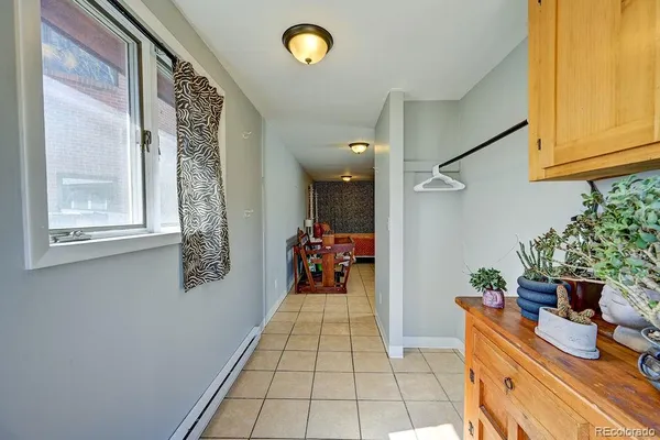a bathroom with a sink mirror vanity and toilet