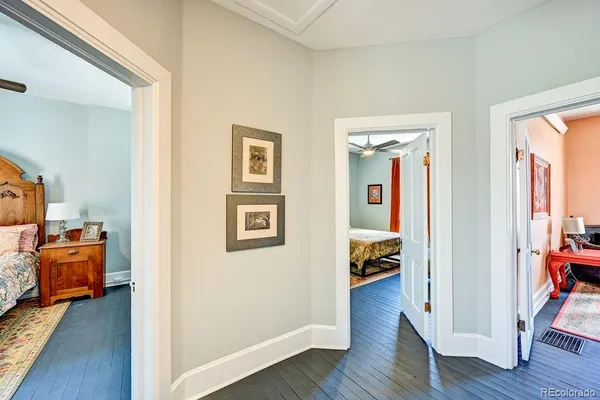 a wooden bench sitting on top of a wooden floor