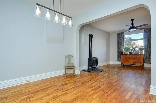 a view of a livingroom with wooden floor