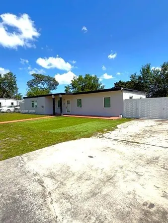 a view of a lake with a big yard
