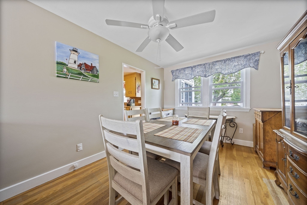 15 D Street Hull, MA 02045 - Photo 8 of 42 a view of a dining room with furniture window and wooden floor