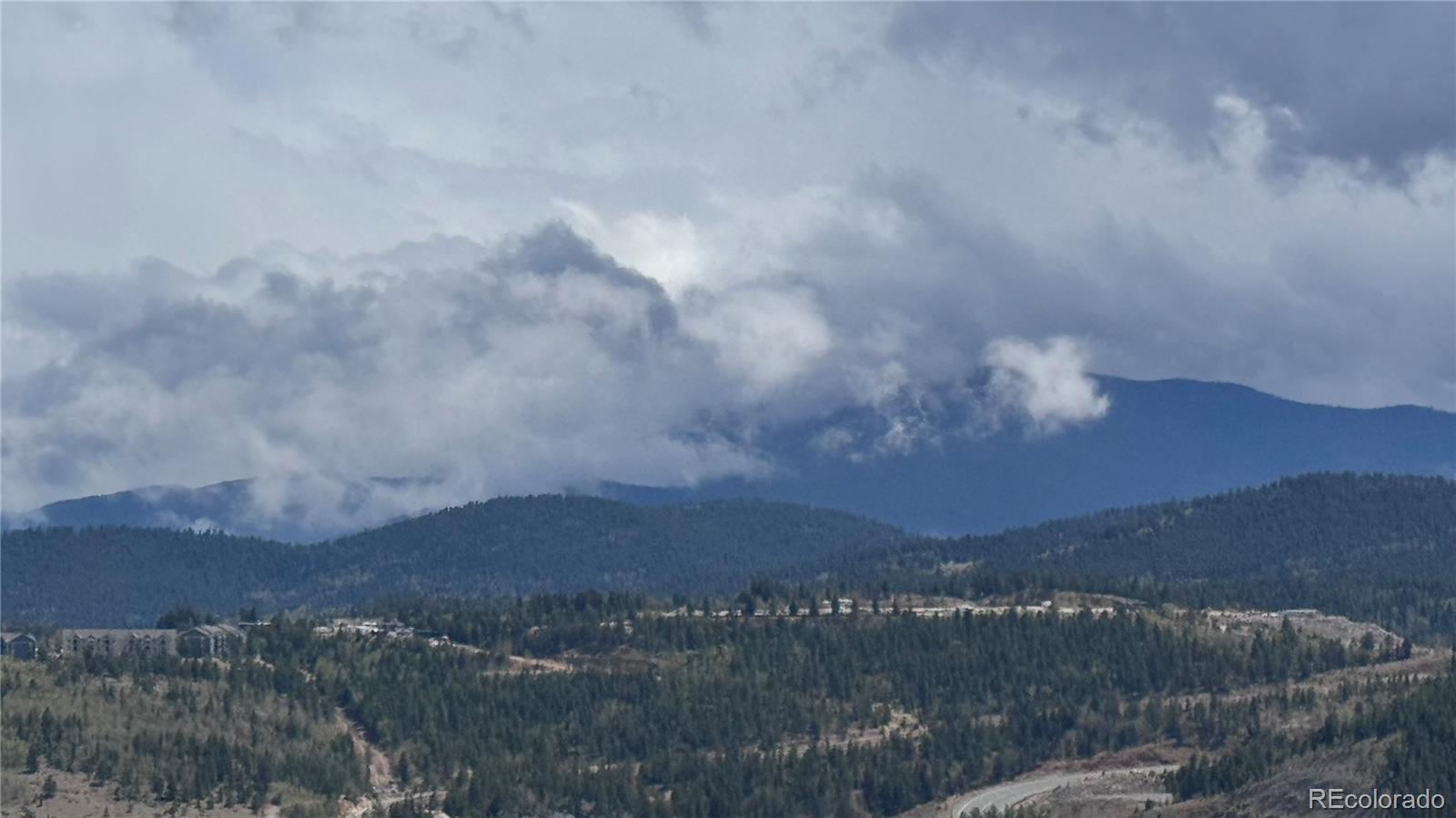 1 Mac Rock Road Central City, CO 80427 - Photo 11 of 20 a view of a town with mountains in the background