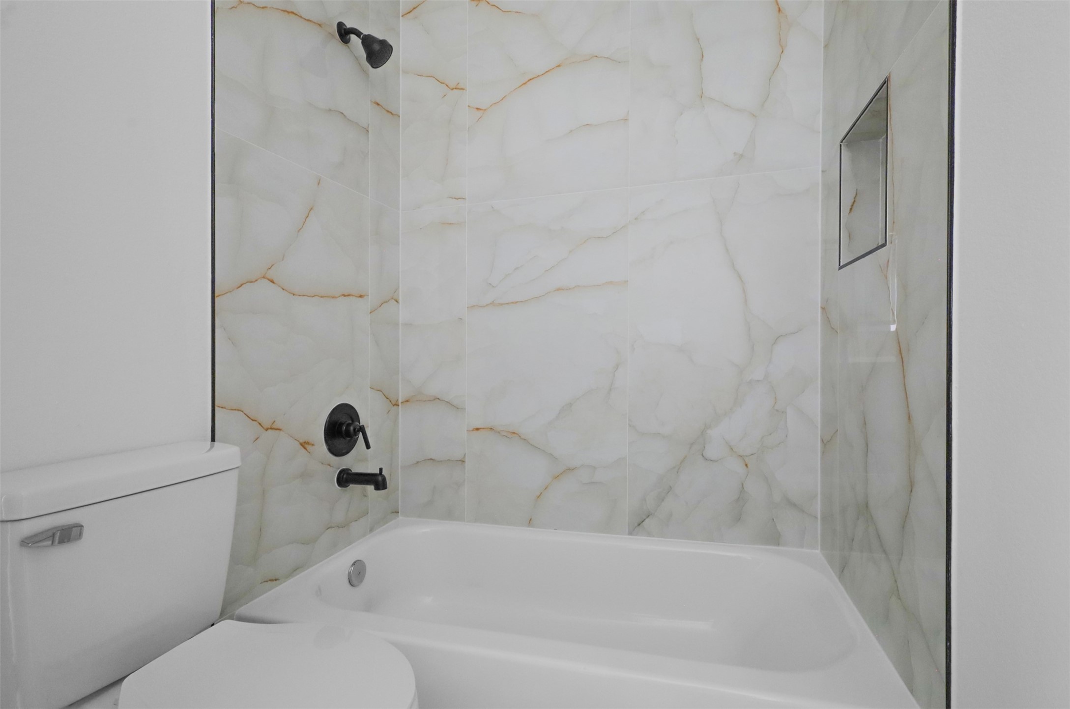 4606 Mallow Street, Unit A Houston, TX 77051 - Photo 18 of 21 a bathroom with a bathtub