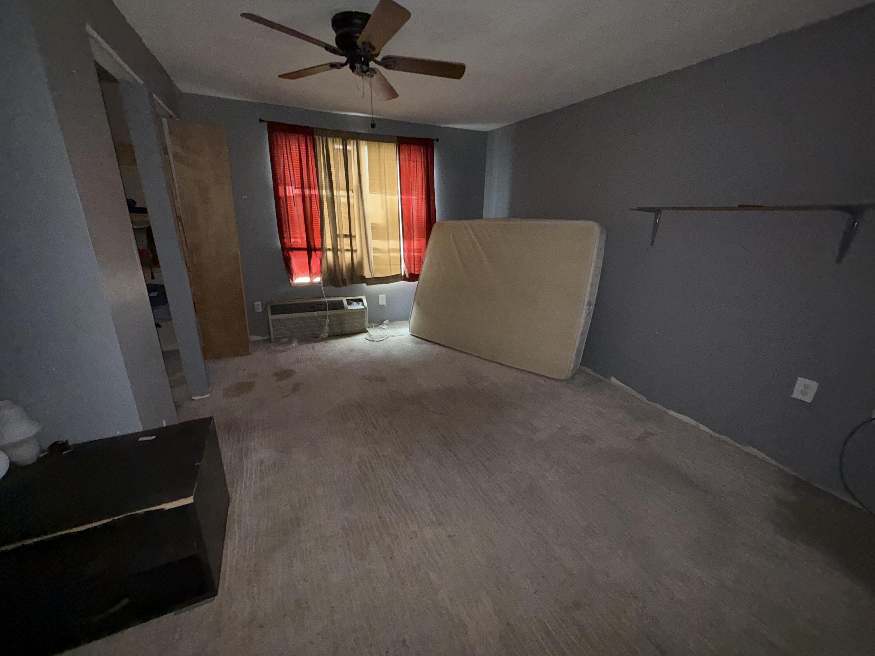 521 46th Street Lubbock, TX 79404 - Photo 7 of 10 a living room with furniture and a window