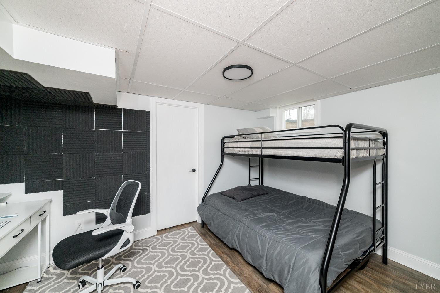 286 Flat Woods Road Amherst, VA 24521 - Photo 28 of 58 a bedroom with a bed and a desk