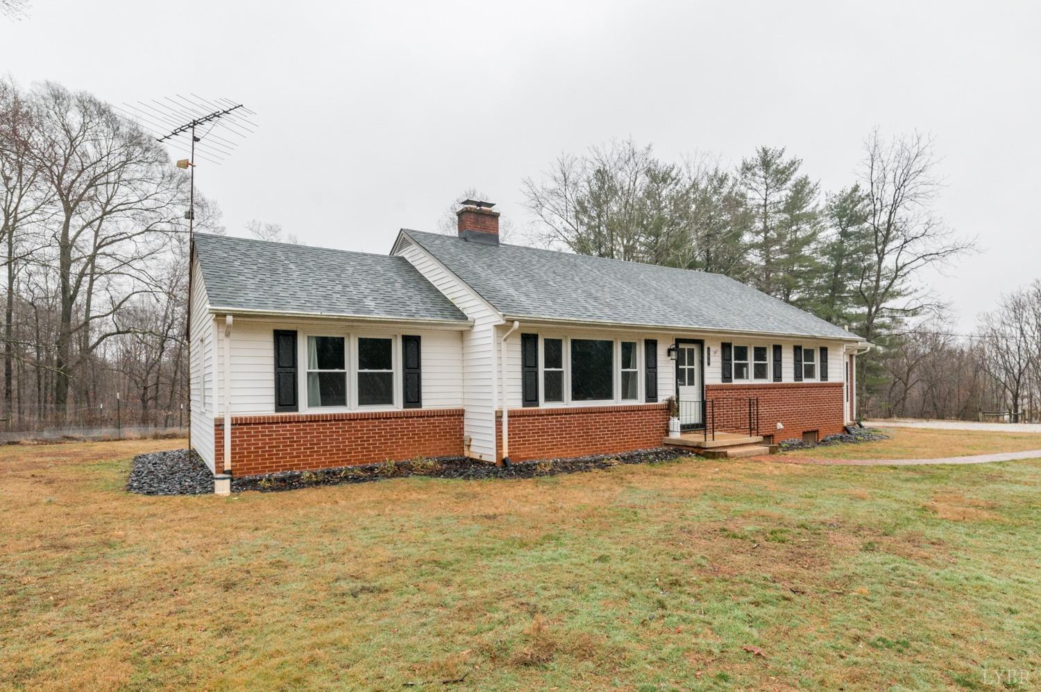 286 Flat Woods Road Amherst, VA 24521 - Photo 43 of 58 a front view of a house with a yard