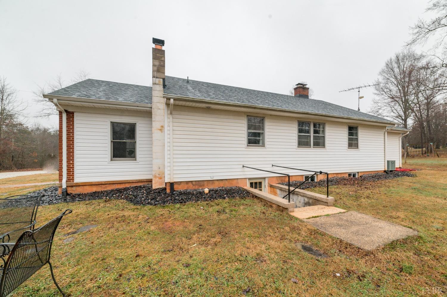 286 Flat Woods Road Amherst, VA 24521 - Photo 51 of 58 a view of house with backyard and sitting area