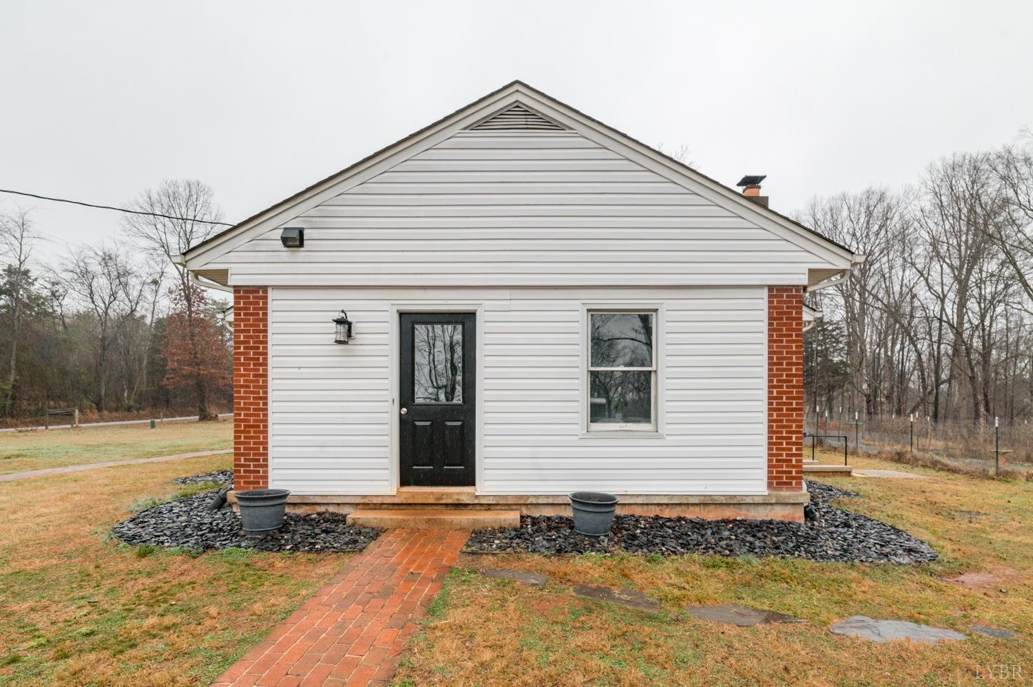 286 Flat Woods Road Amherst, VA 24521 - Photo 53 of 58 a view of a house with a yard