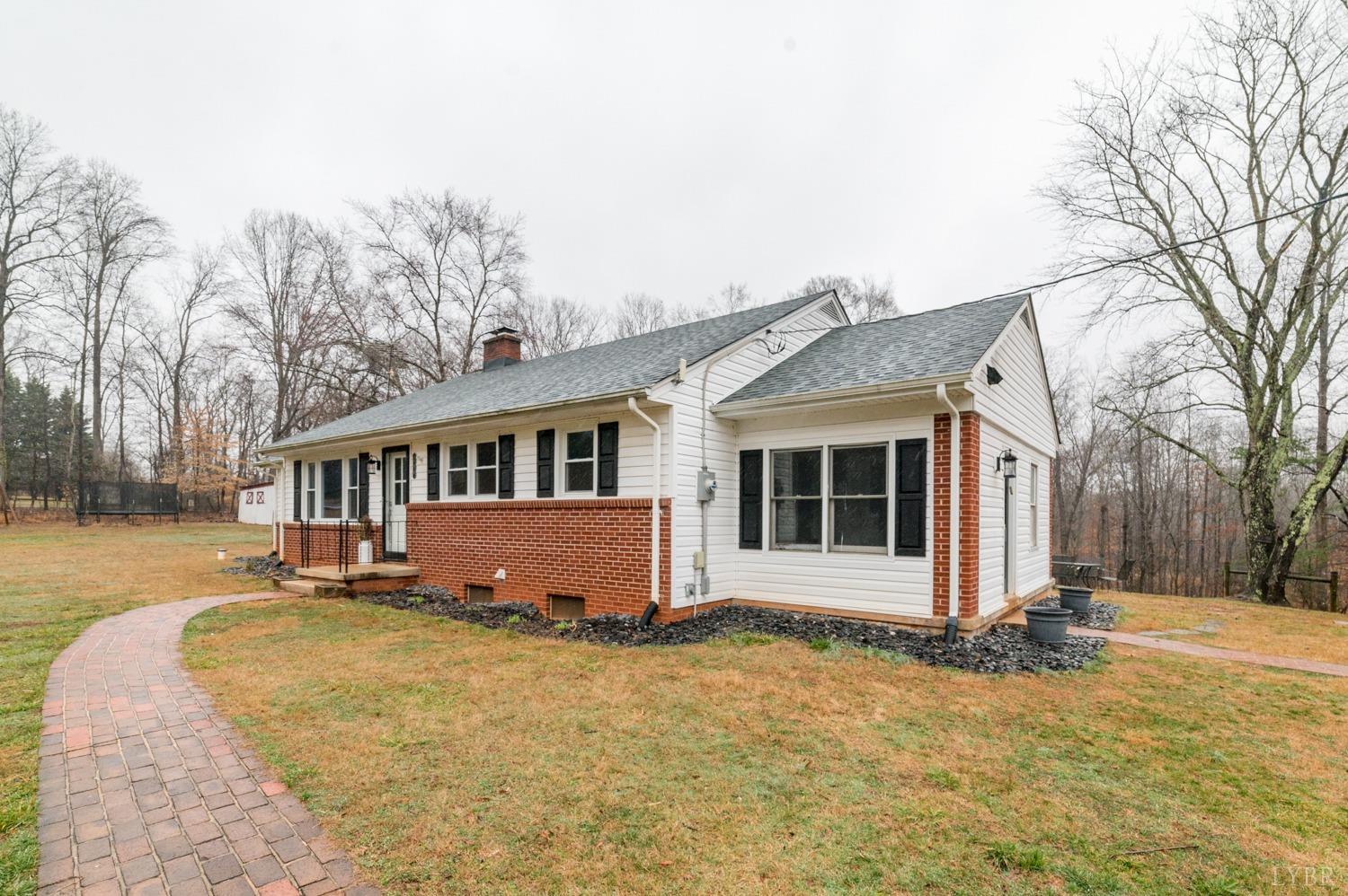 286 Flat Woods Road Amherst, VA 24521 - Photo 54 of 58 a front view of a house with a yard
