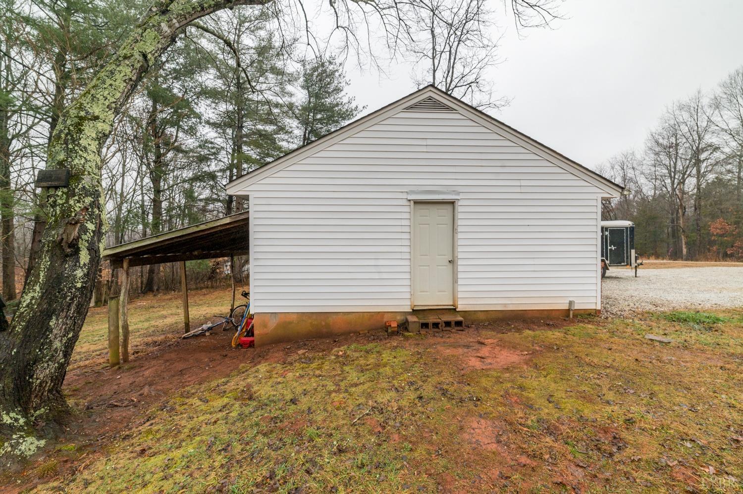 286 Flat Woods Road Amherst, VA 24521 - Photo 56 of 58 a view of a house with a yard
