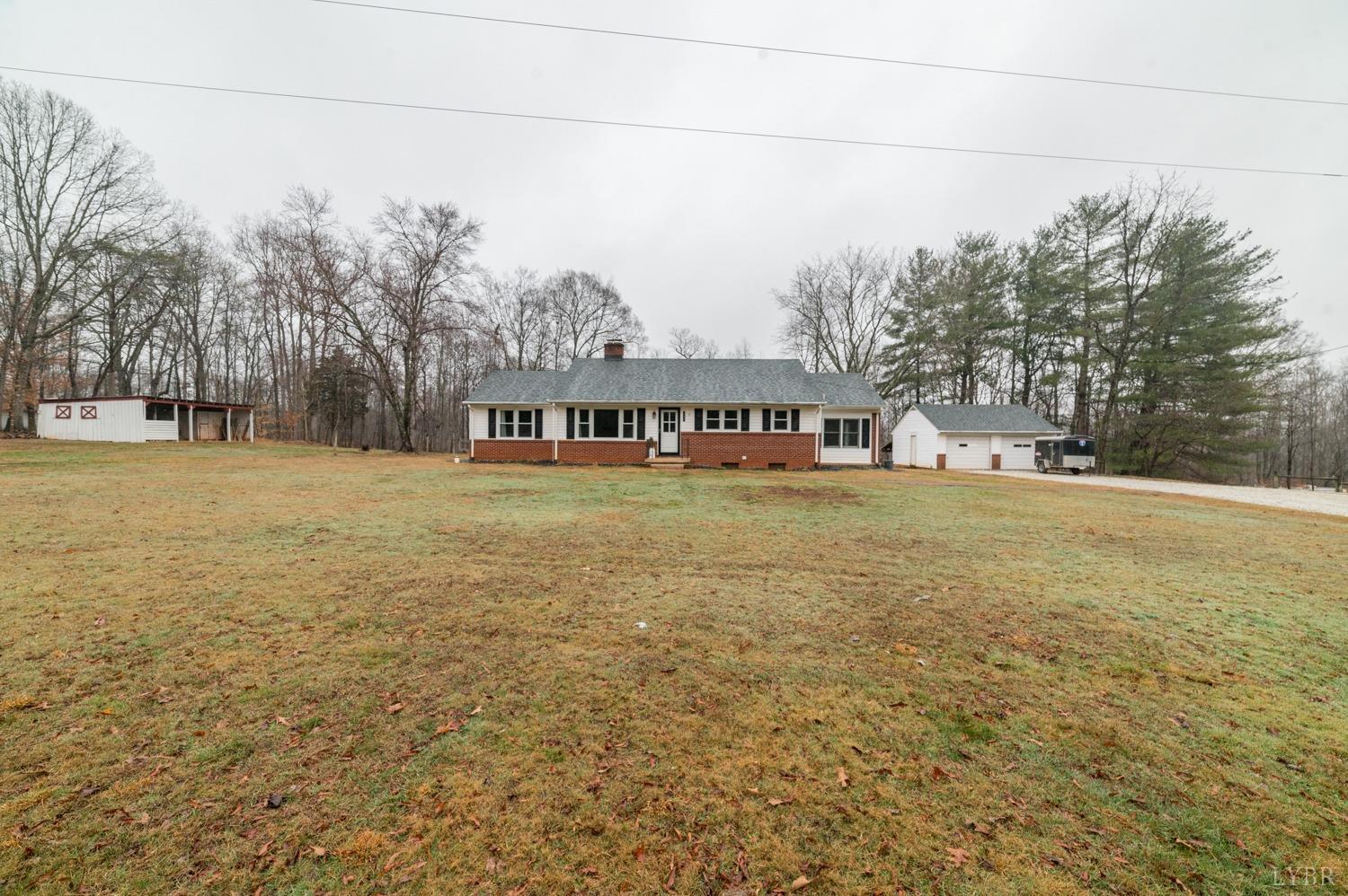 286 Flat Woods Road Amherst, VA 24521 - Photo 58 of 58 a view of a building with trees in the background