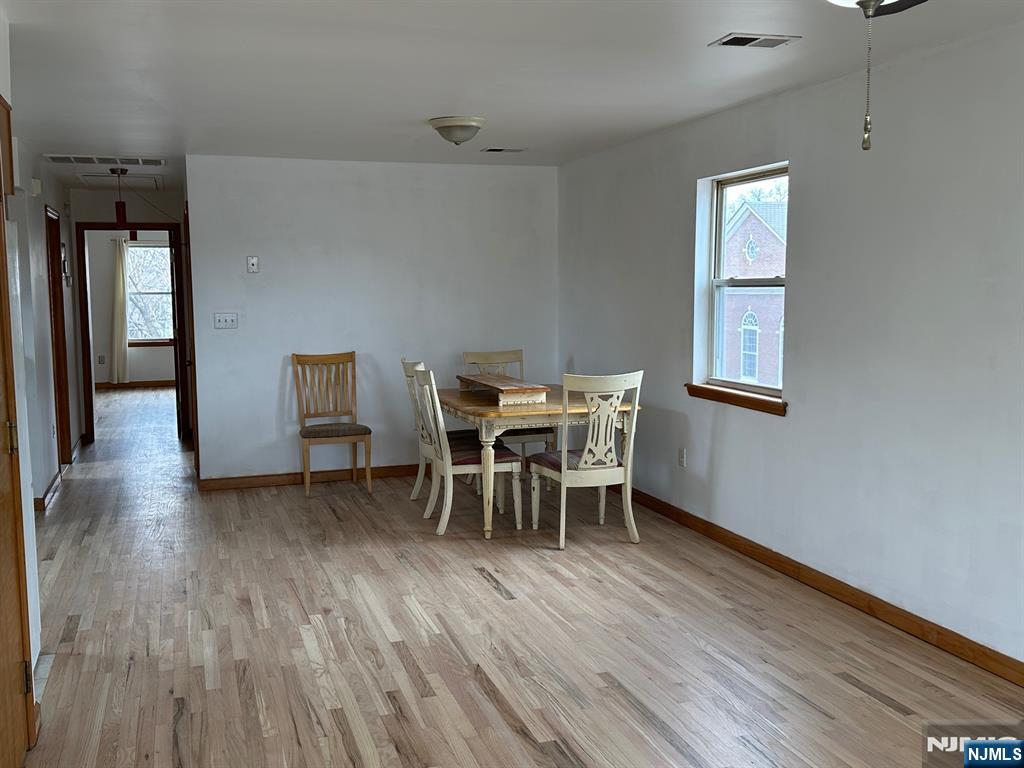408 Jersey Street Harrison, NJ 07029 - Photo 7 of 10 a dining room with furniture and window