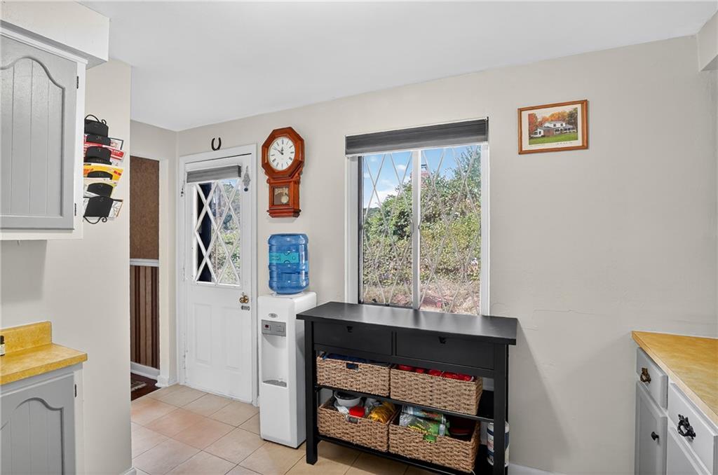 5765 Library Road Bethel Park, PA 15102 - Photo 11 of 34 a living room with furniture and a window