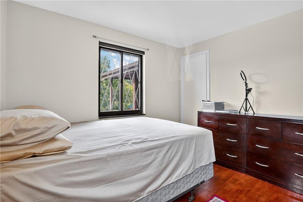 5765 Library Road Bethel Park, PA 15102 - Photo 12 of 34 a bedroom with a bed and a closet