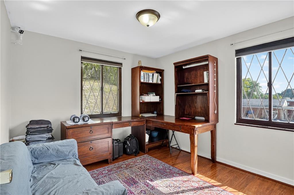 5765 Library Road Bethel Park, PA 15102 - Photo 13 of 34 a view of a workspace with furniture and a window