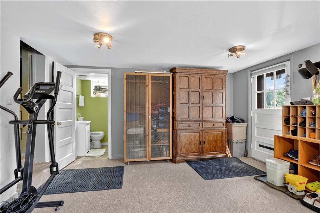 5765 Library Road Bethel Park, PA 15102 - Photo 19 of 34 a view of a livingroom with furniture and an empty room