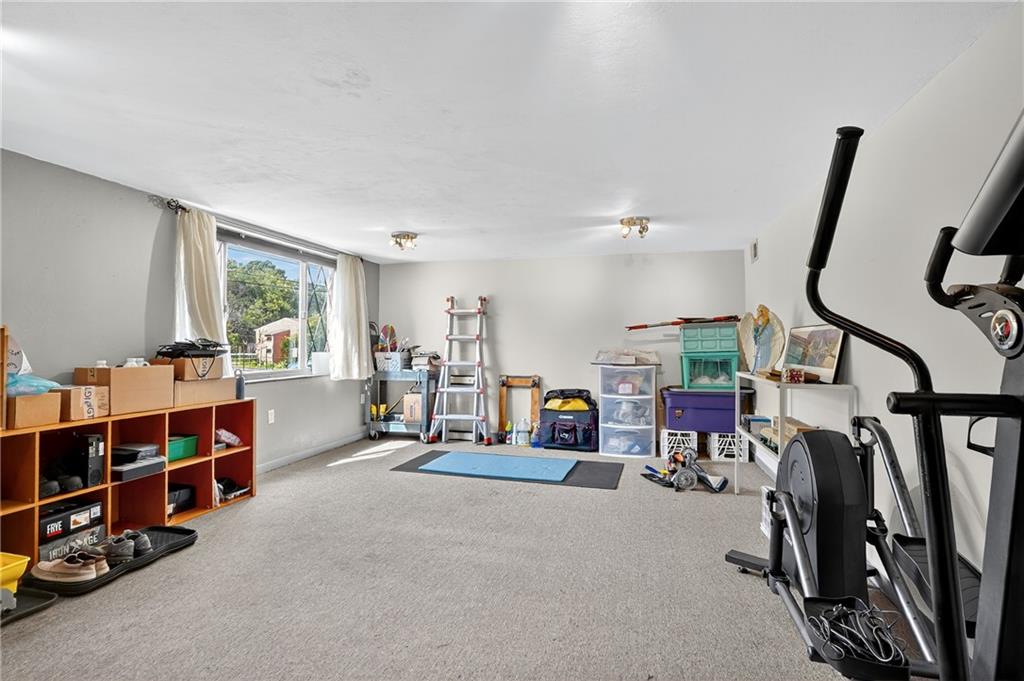 5765 Library Road Bethel Park, PA 15102 - Photo 20 of 34 a view of a room with lots of furniture and windows