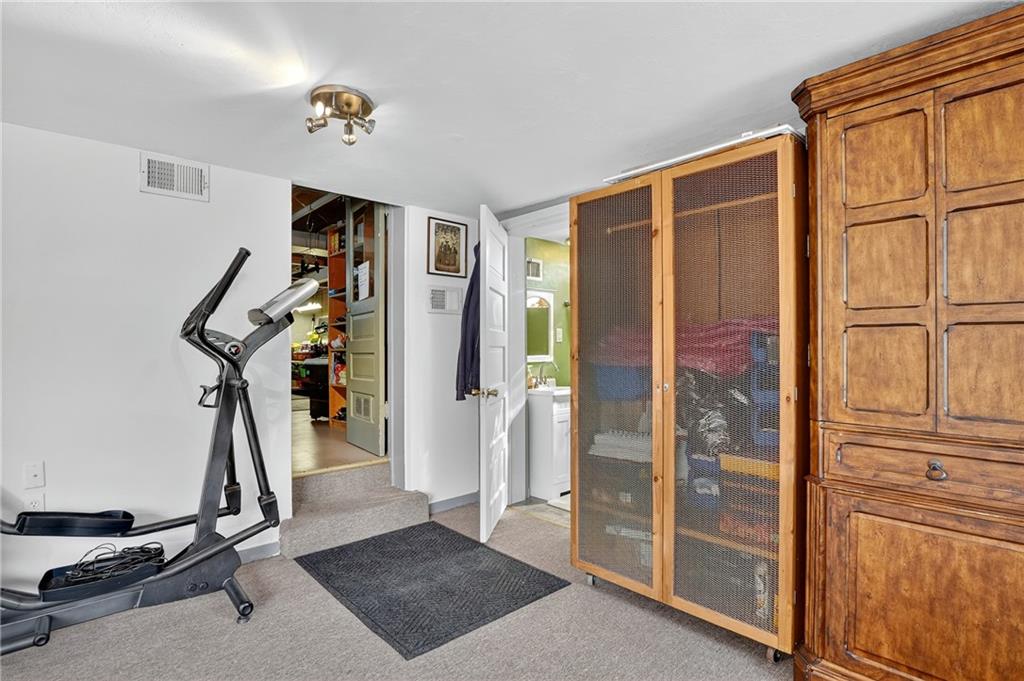 5765 Library Road Bethel Park, PA 15102 - Photo 23 of 34 a view of a room with gym equipment