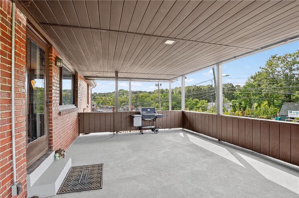 5765 Library Road Bethel Park, PA 15102 - Photo 29 of 34 a view of an outdoor space with porch and furniture