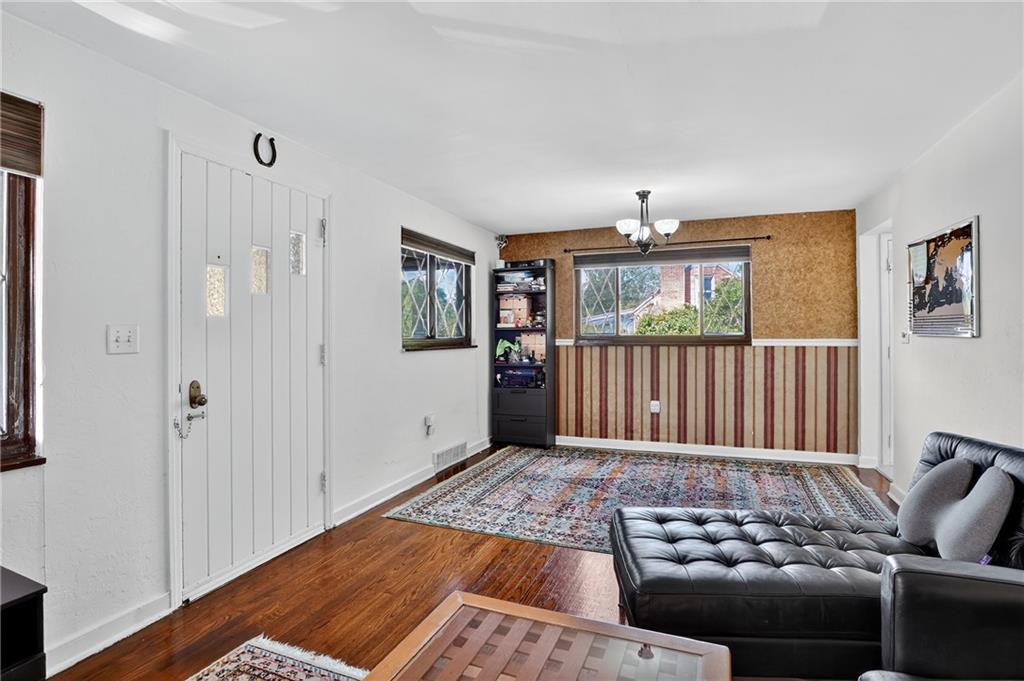 5765 Library Road Bethel Park, PA 15102 - Photo 5 of 34 a living room with furniture and wooden floor