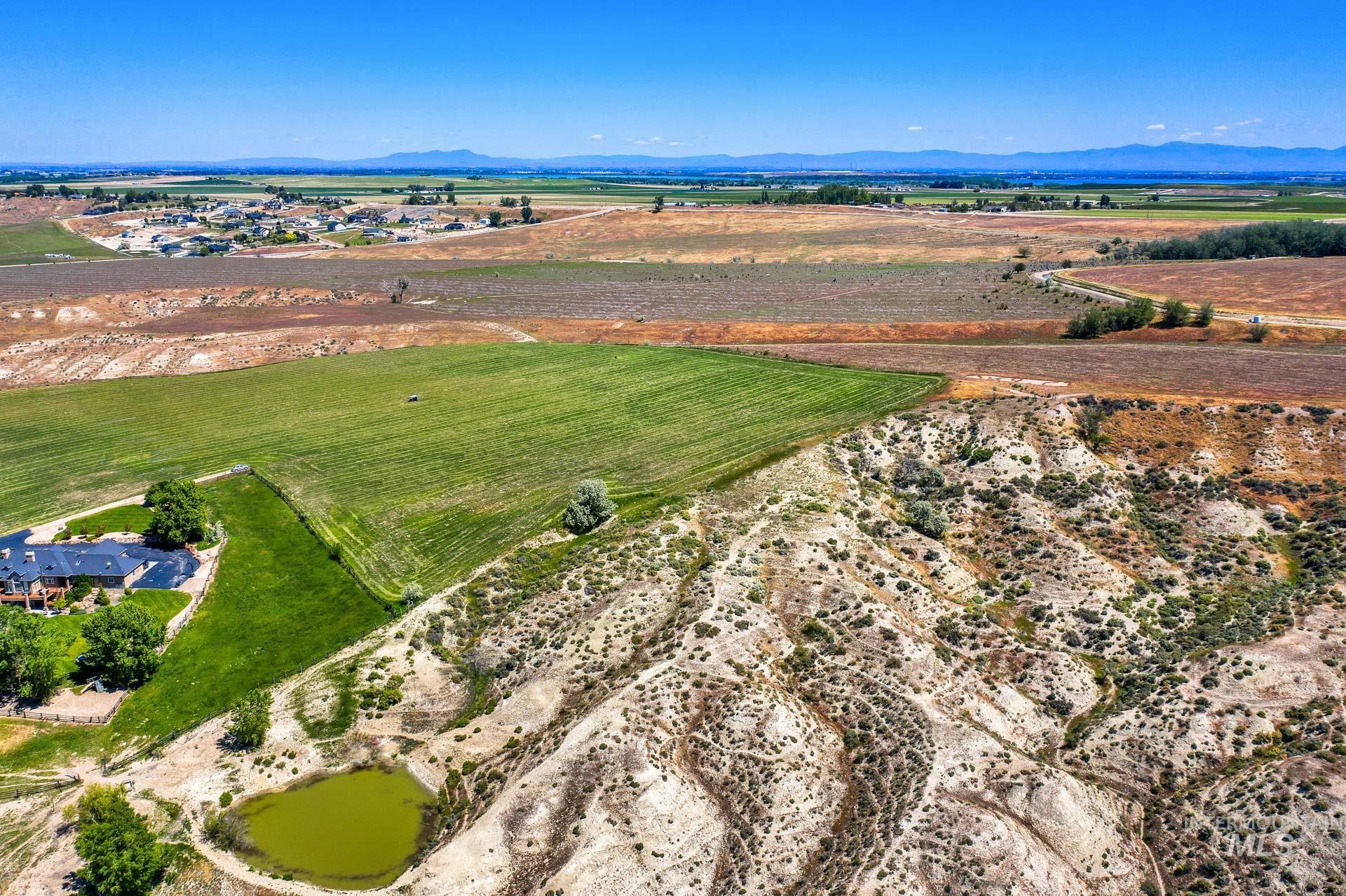 Tbd Randall Lane Caldwell, ID 83607 - Photo 9 of 13 Overview of rural landscape featuring farmland and mountains