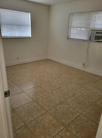 a view of a refrigerator in kitchen
