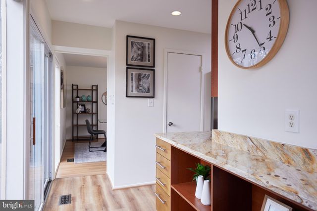 a view of a hallway with elevator