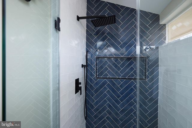 a view of empty room with windows