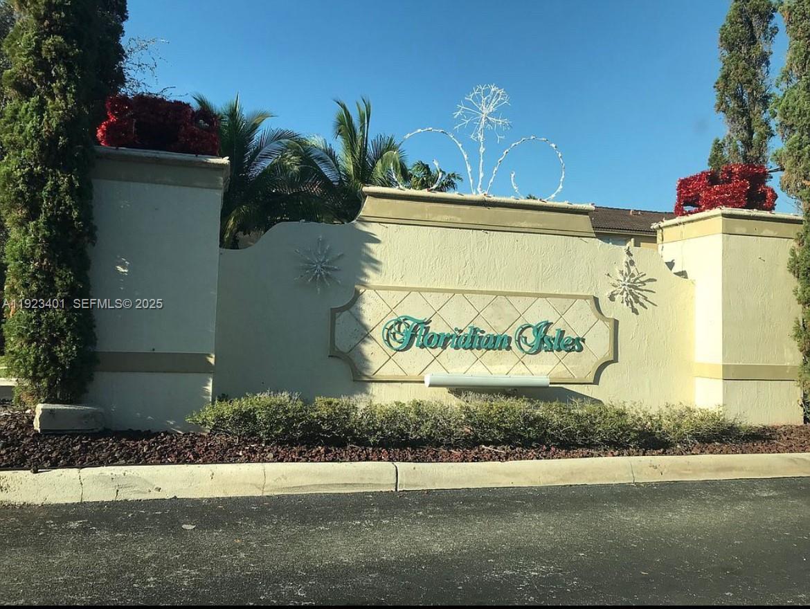 4110 Northeast 24th Street Homestead, FL 33033 - Photo 3 of 16 a sign that is on the side of a road