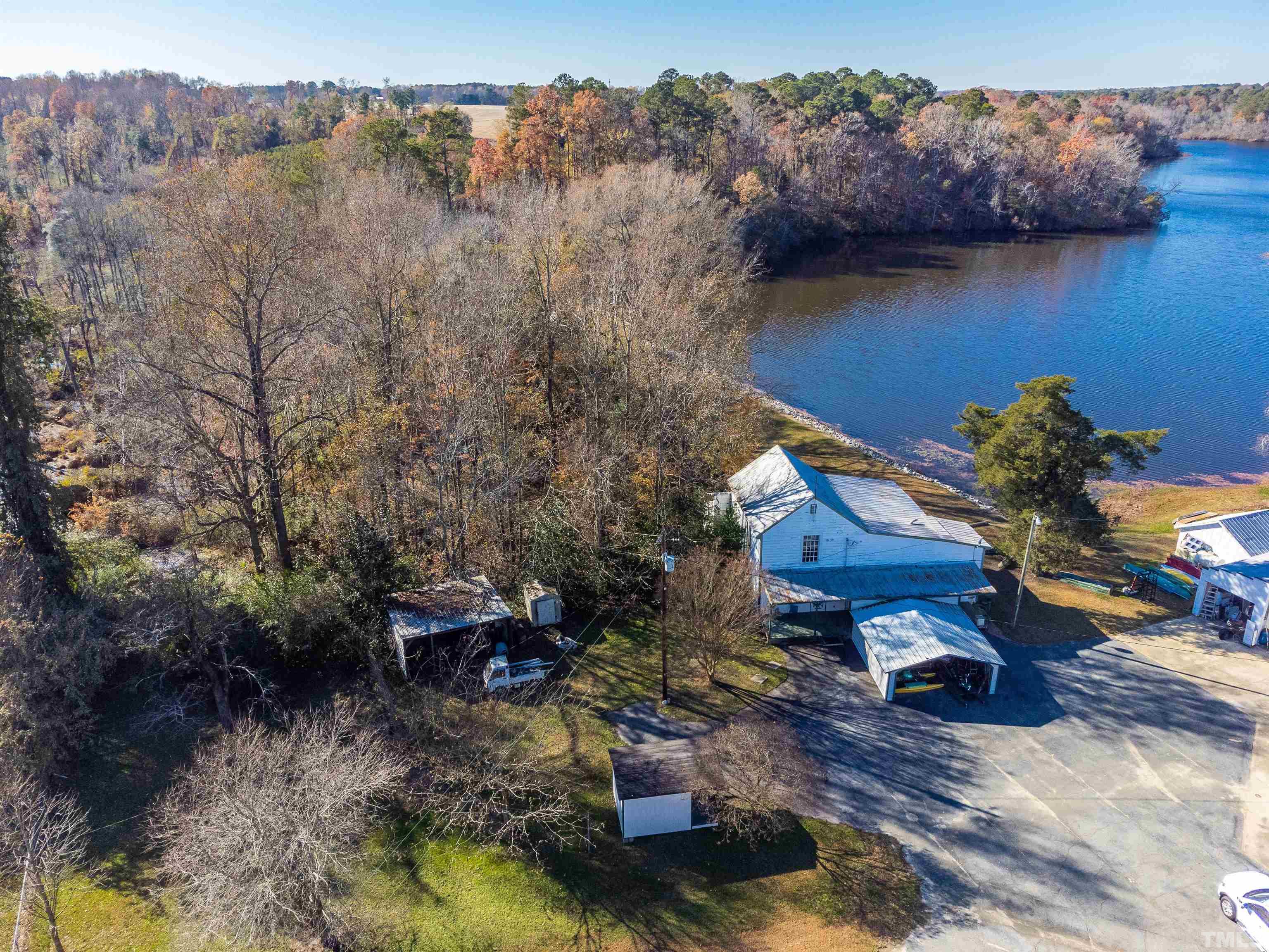 8214 Panther Lake Road Willow Spring, NC 27592 - Photo 3 of 28 a view of swimming pool with a yard