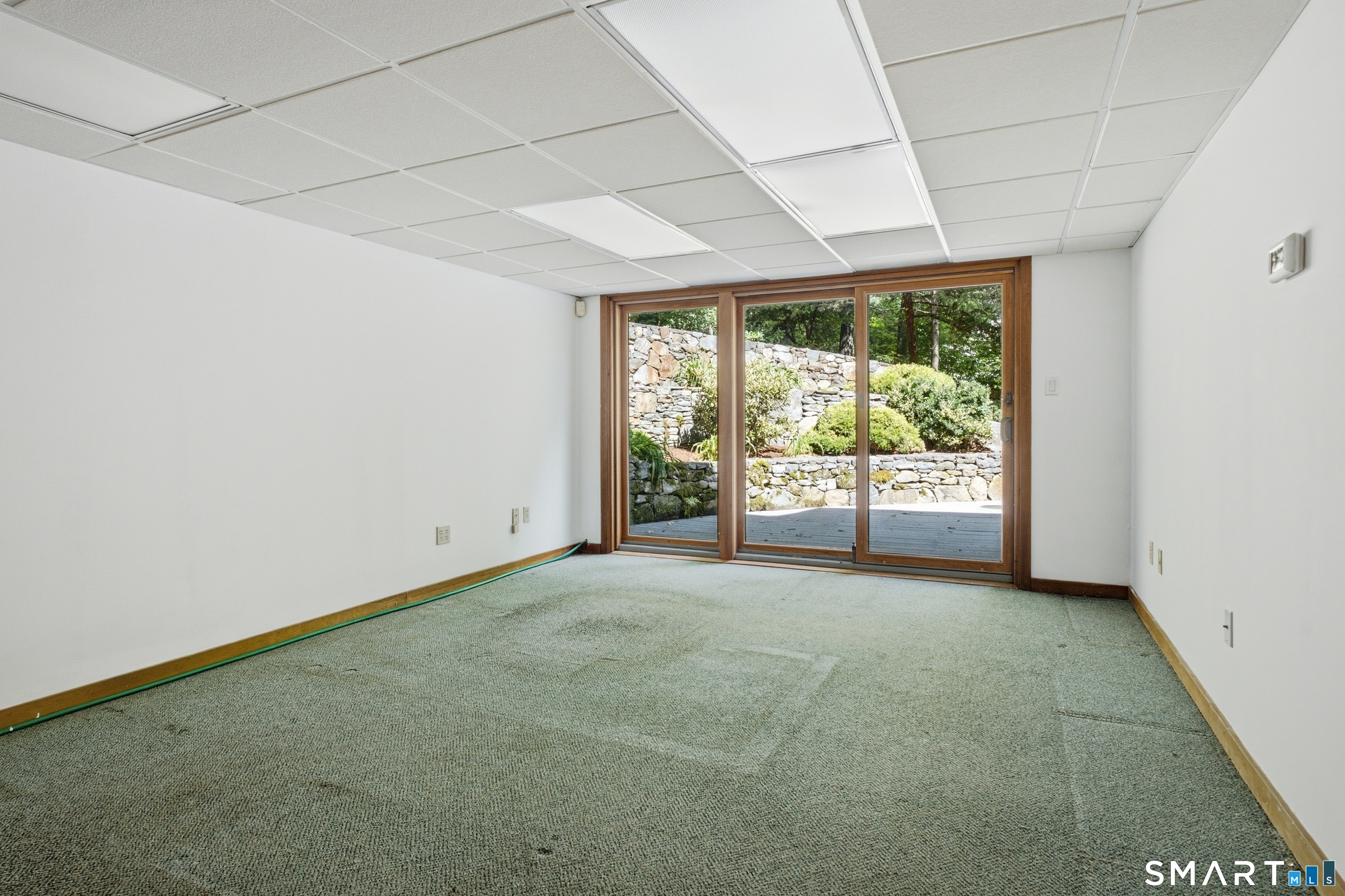 53 Summer Hill Road Madison, CT 06443 - Photo 6 of 21 Large office w/sliders to deck ~ perhaps transform into a spectacular, expansive primary bedroom suite??