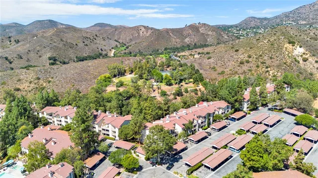 a view of a city with mountains in the background