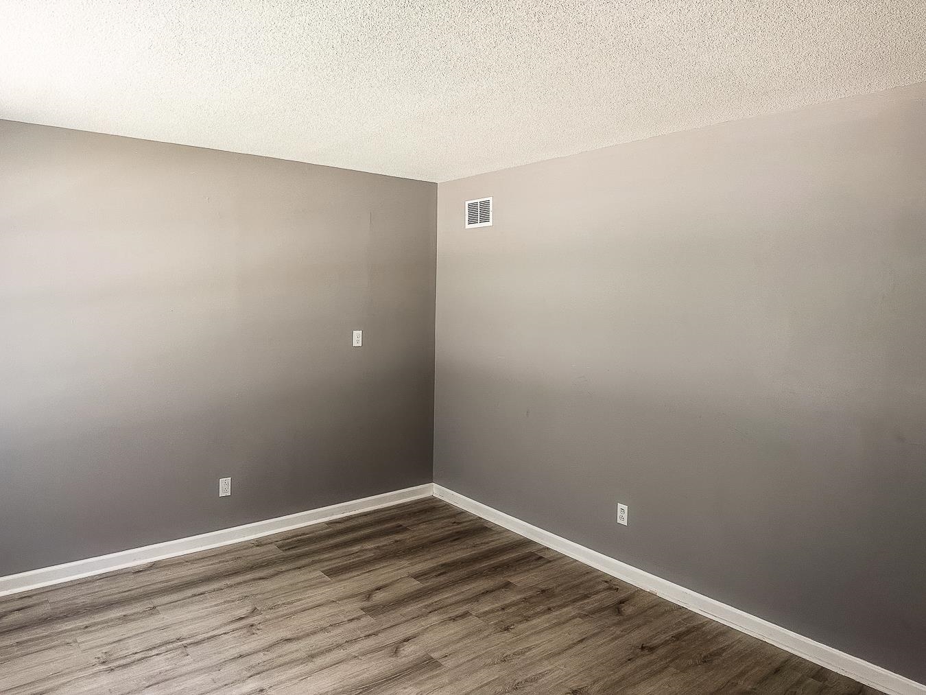 3909 Range Line Road Memphis, TN 38127 - Photo 16 of 31 a view of an empty room with wooden floor