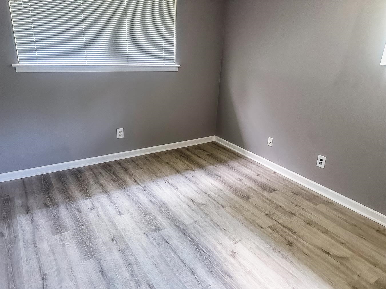 3909 Range Line Road Memphis, TN 38127 - Photo 22 of 31 a view of room with window and hardwood floor